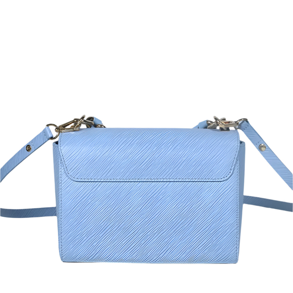 Epi twist shoulder bag celeste