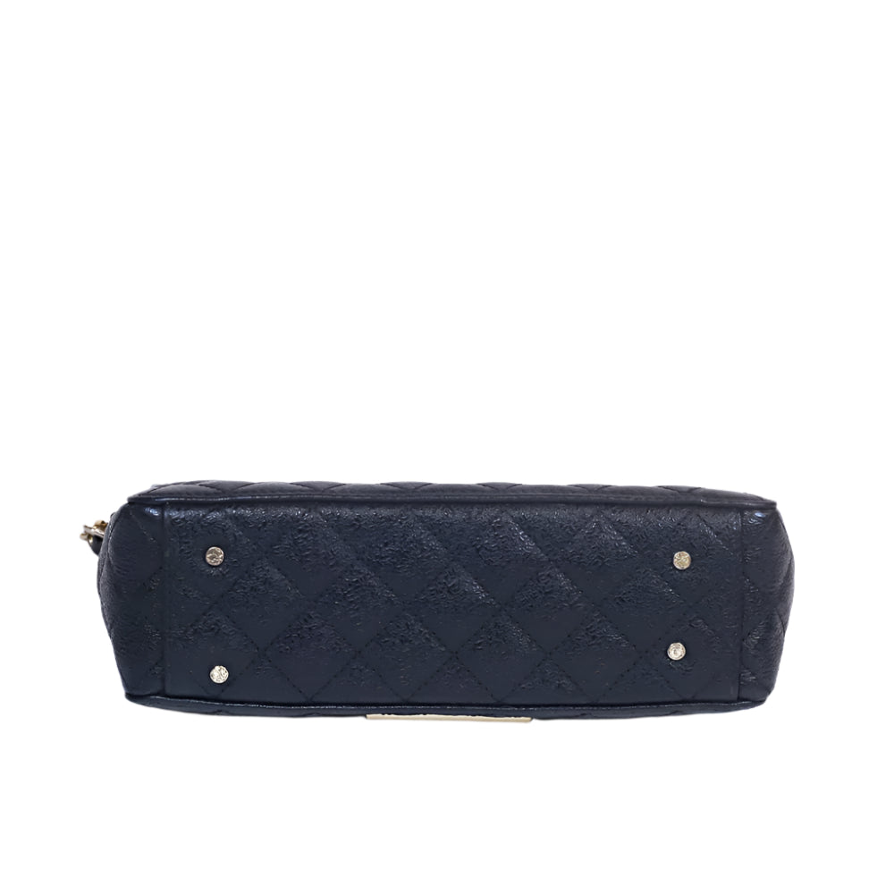 Quilted baret en negro