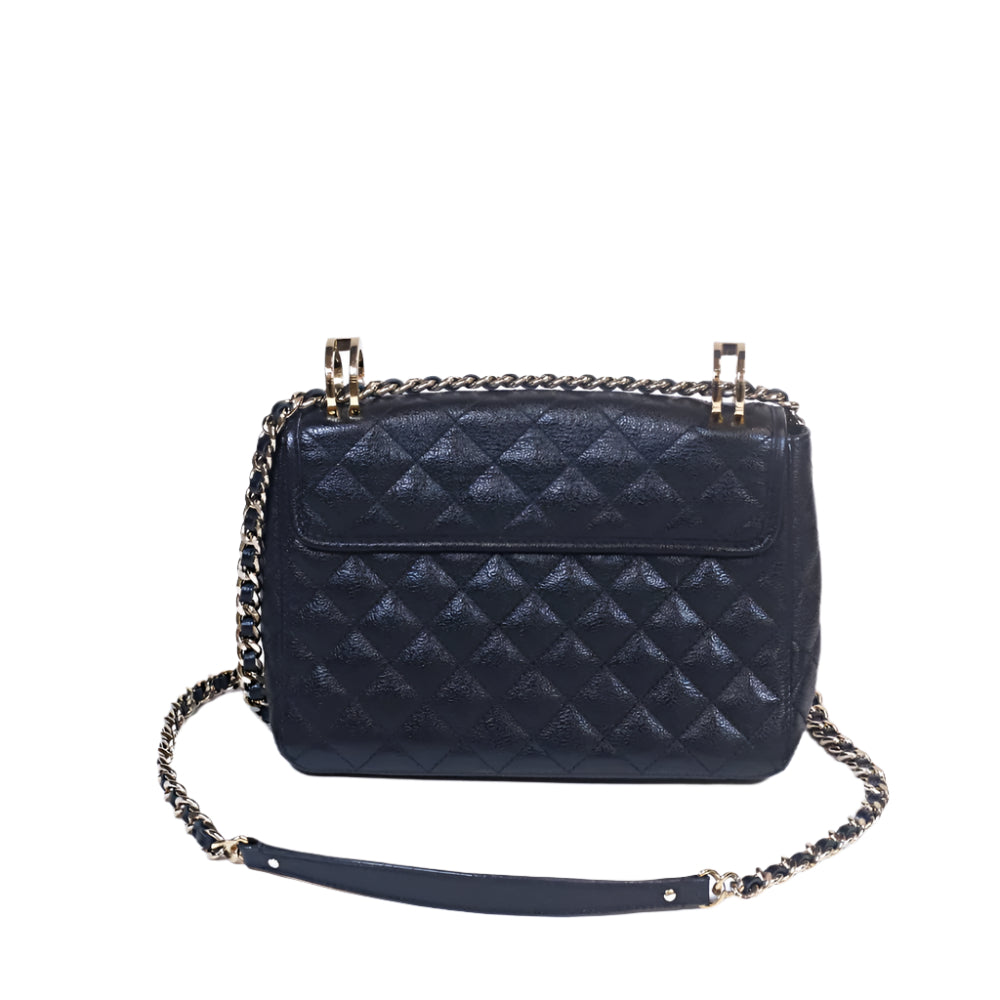 Quilted baret en negro