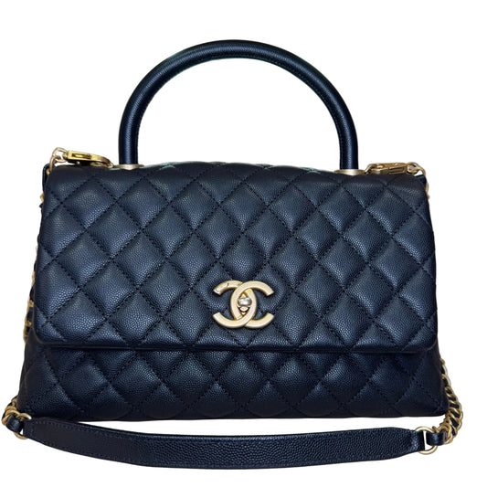 Black flap bag with top handle with crossbody strap calfskin and gold hardware Medium