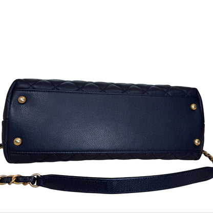 Black flap bag with top handle with crossbody strap calfskin and gold hardware Medium