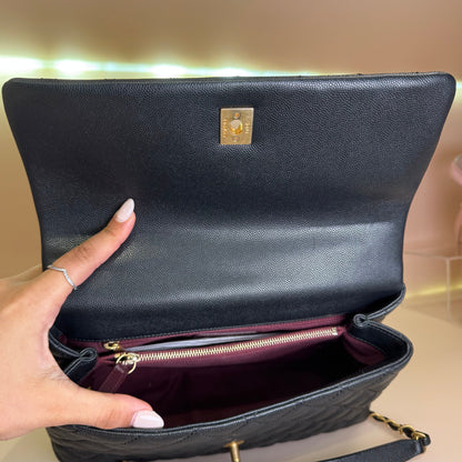 Black flap bag with top handle with crossbody strap calfskin and gold hardware Medium