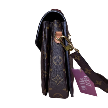 Pochette Metis monogram canvas