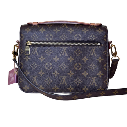 Pochette Metis monogram canvas