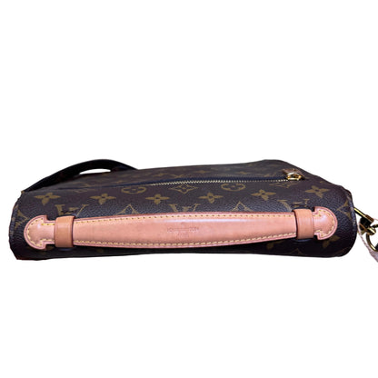 Pochette Metis monogram canvas