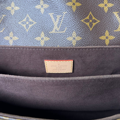 Pochette Metis monogram canvas