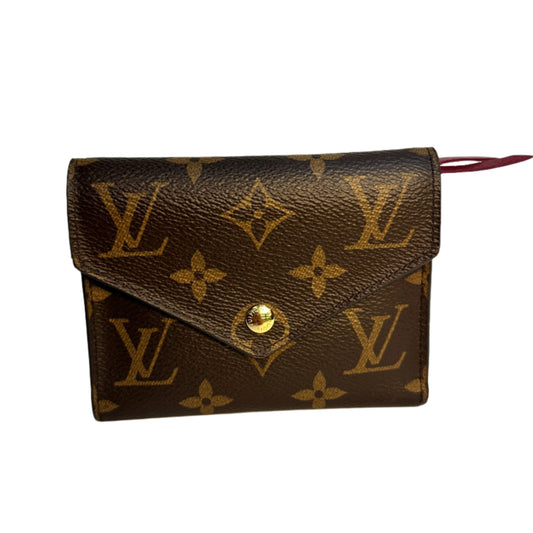 Victorine wallet monogram fucsia interior con iniciales