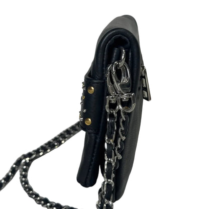 Rock leather clutch bag with studs