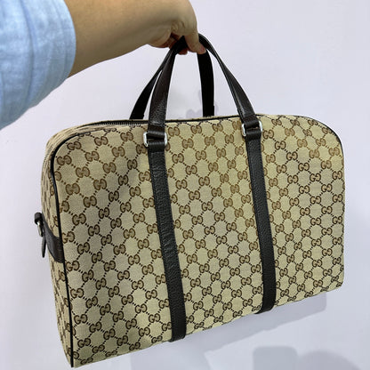 GG canvas brown leather carry on Duffle bag
