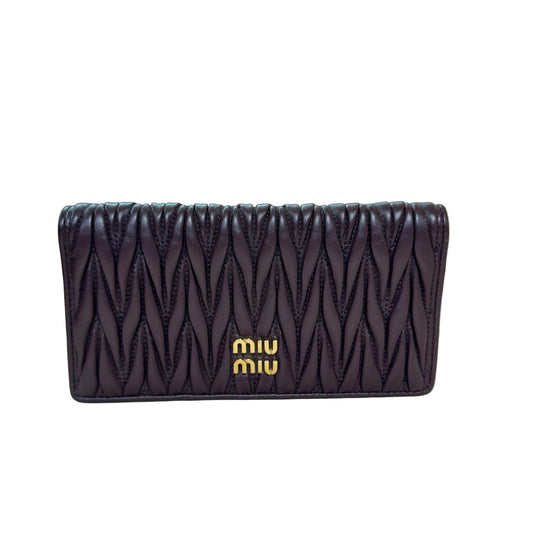 Matelassé brown long flap wallet