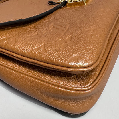 Louis Vuitton Pochette Metis Empreinte Leather Cognac