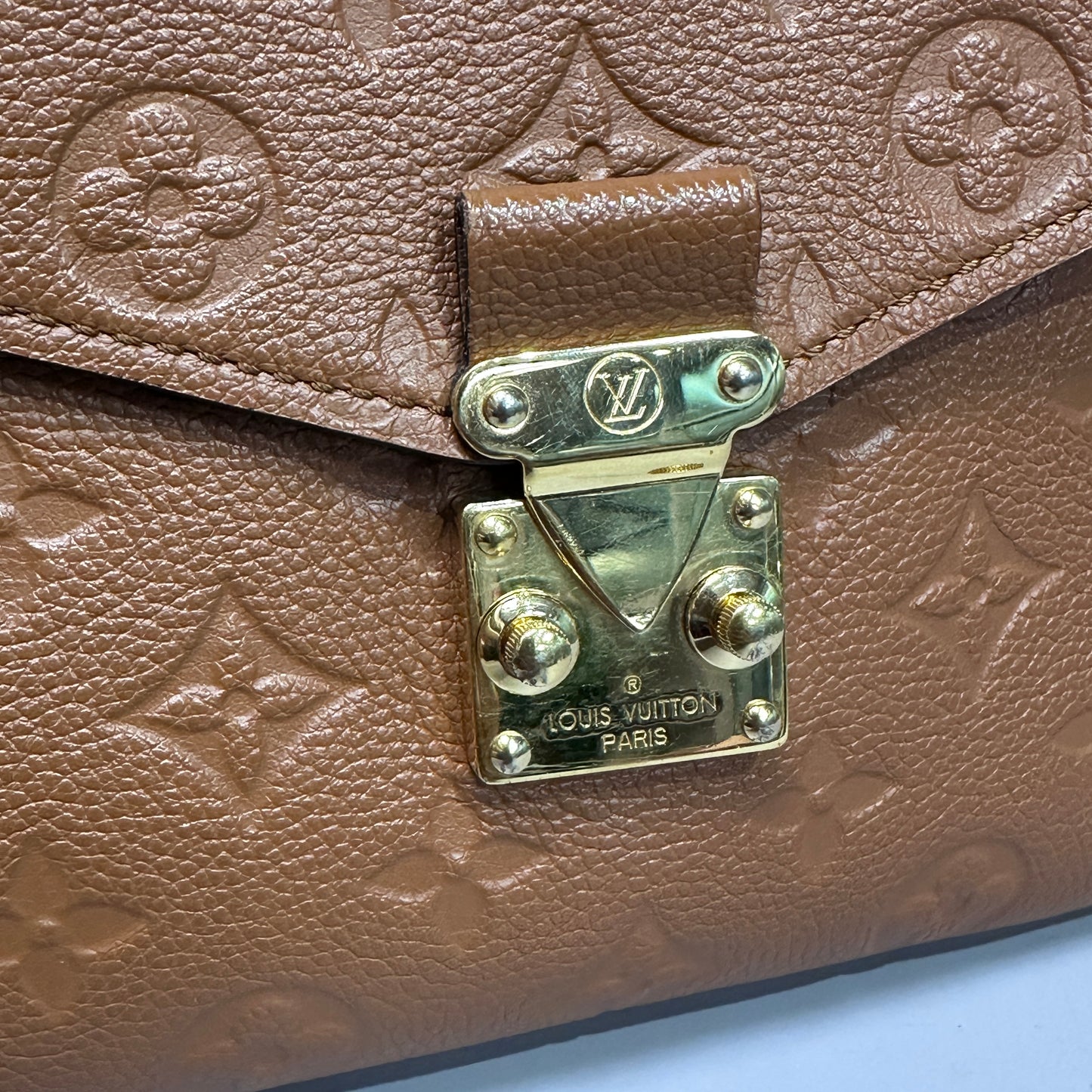 Louis Vuitton Pochette Metis Empreinte Leather Cognac