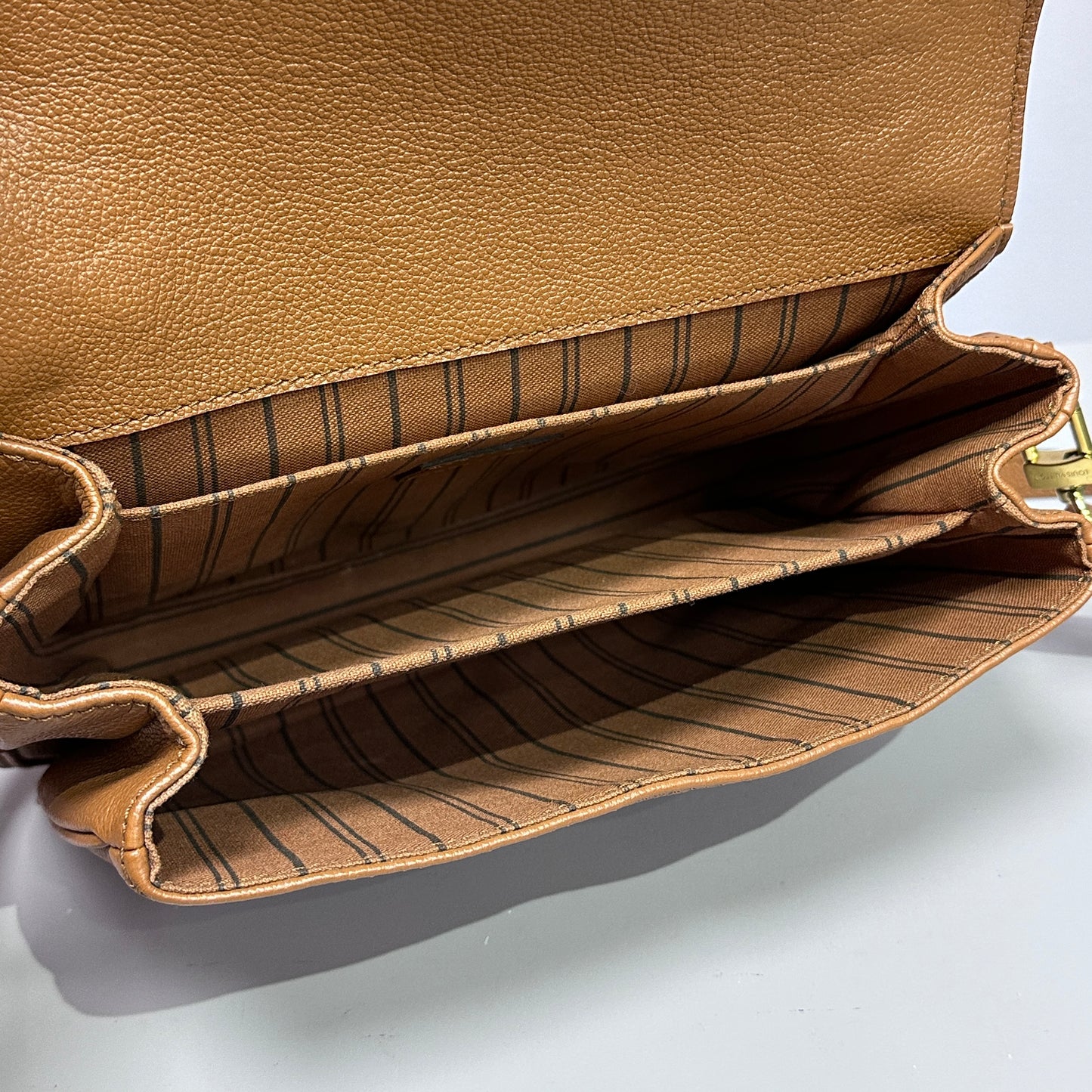 Louis Vuitton Pochette Metis Empreinte Leather Cognac