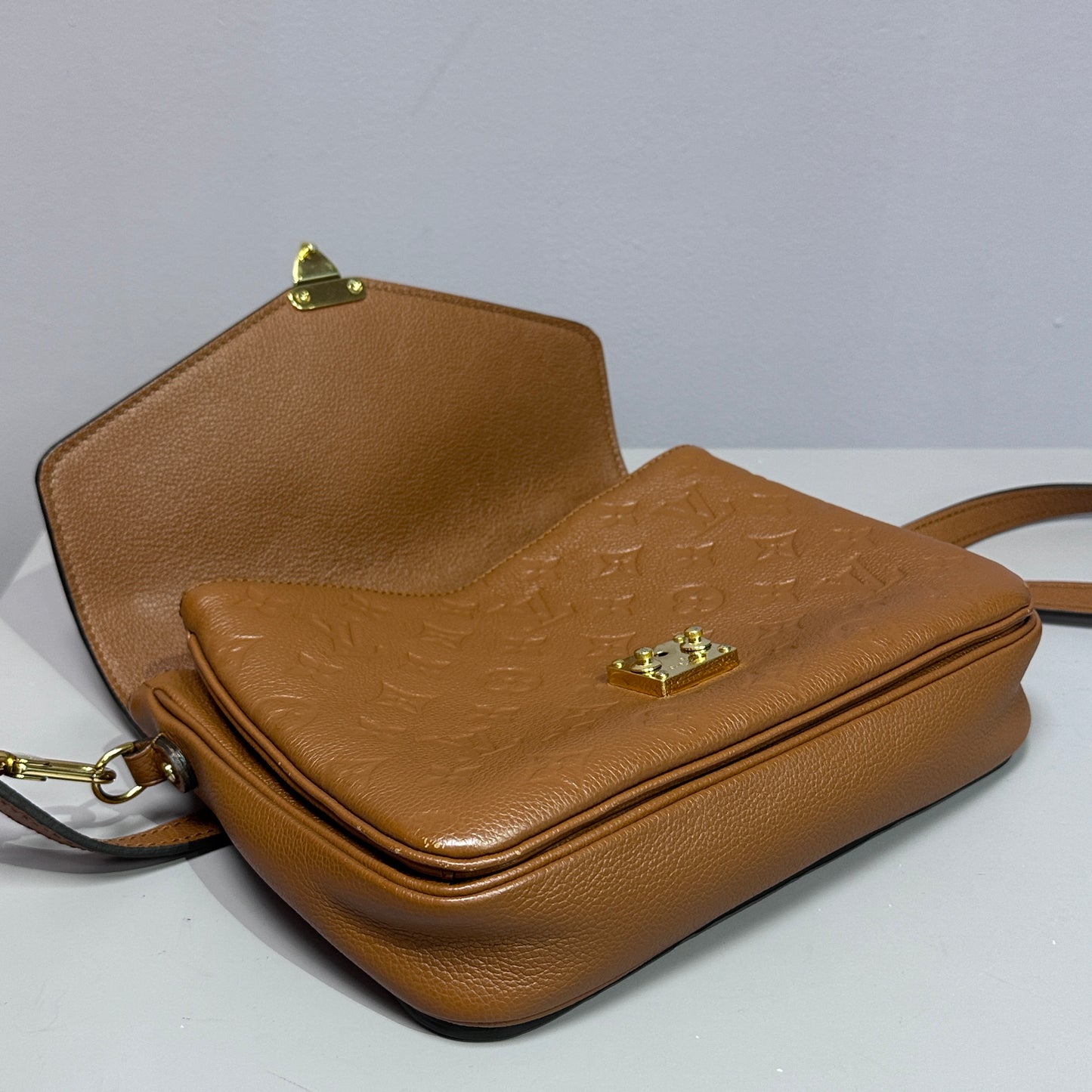 Louis Vuitton Pochette Metis Empreinte Leather Cognac