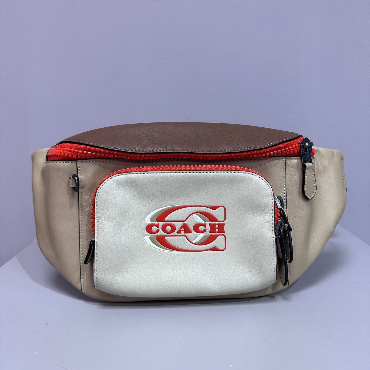 Belt bag crea y naranja