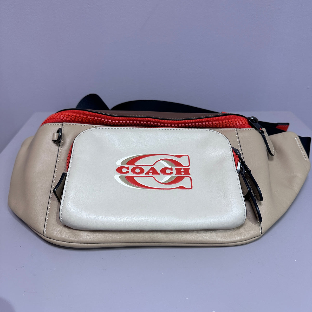 Belt bag crea y naranja