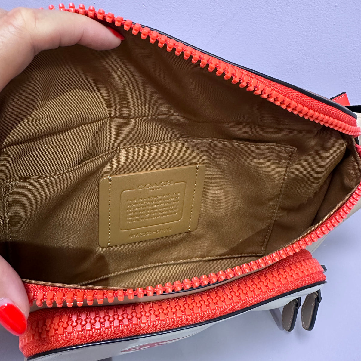 Belt bag crea y naranja